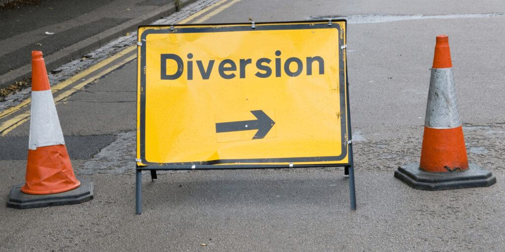 road sign showing diversion in place